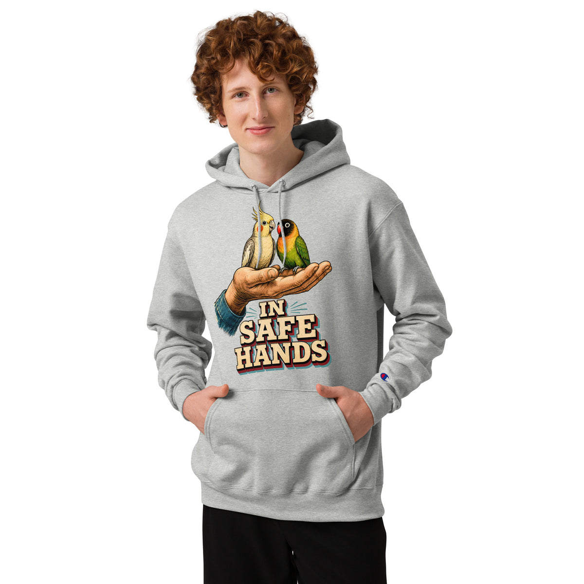 In Safe Hands Unisex Champion Hoodie - Retro Cockatiel & Lovebird Parrot Lovers Pullover H-12 by printfluence.net