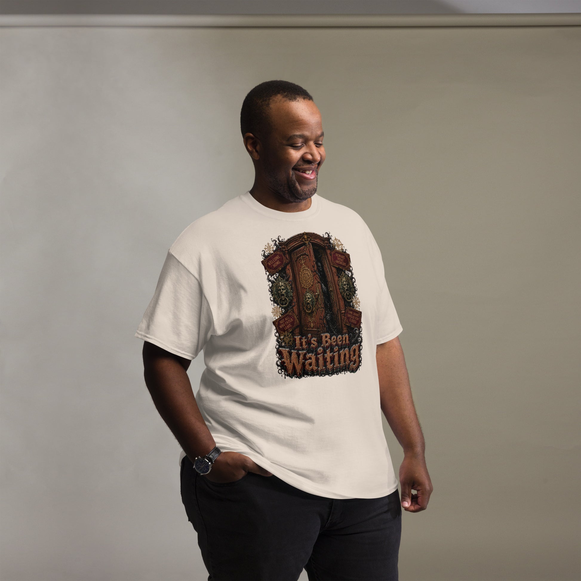 Horror and Mystery Lovers Unisex Classic Tee — "It's Been Waiting" Haunted Door and Creepy Entity Design by printfluence.net