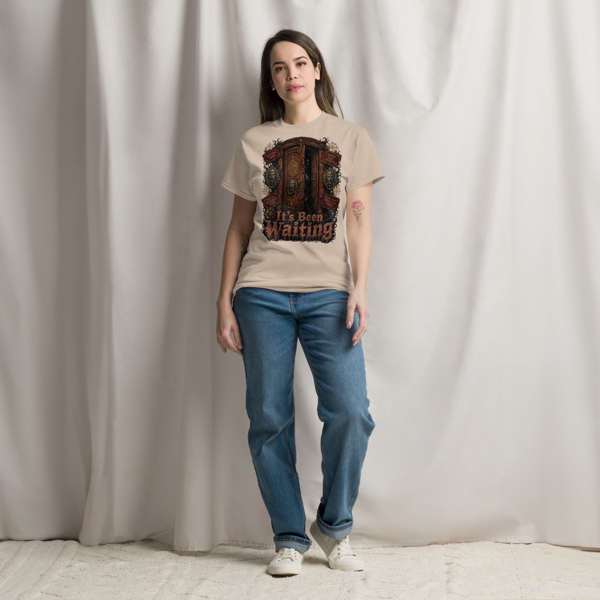 Horror and Mystery Lovers Unisex Classic Tee — "It's Been Waiting" Haunted Door and Creepy Entity Design by printfluence.net