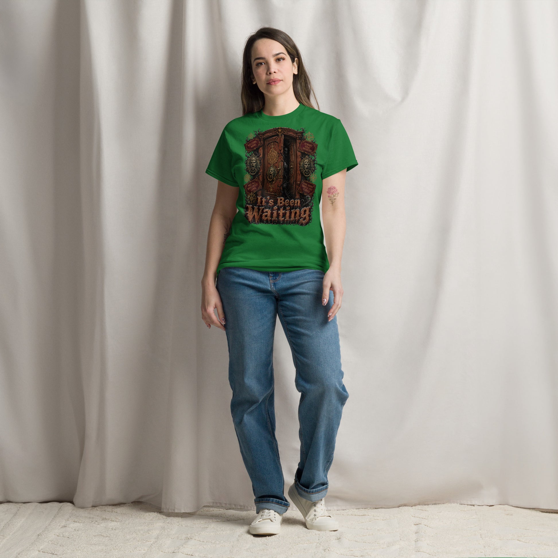 Horror and Mystery Lovers Unisex Classic Tee — "It's Been Waiting" Haunted Door and Creepy Entity Design by printfluence.net