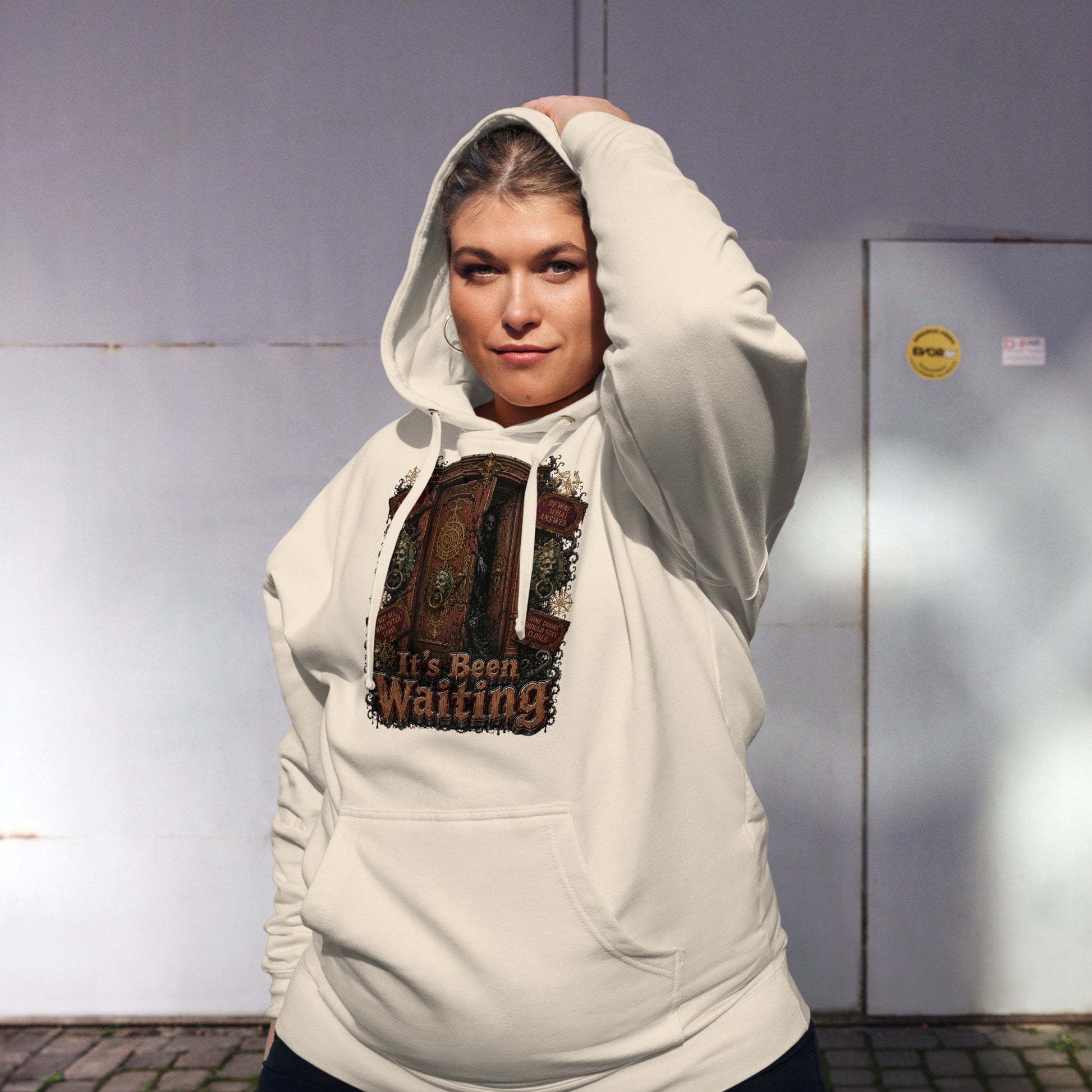 Horror and Mystery Lovers Unisex Midweight Hoodie — "It's Been Waiting" Haunted Door and Creepy Entity Design by printfluence.net
