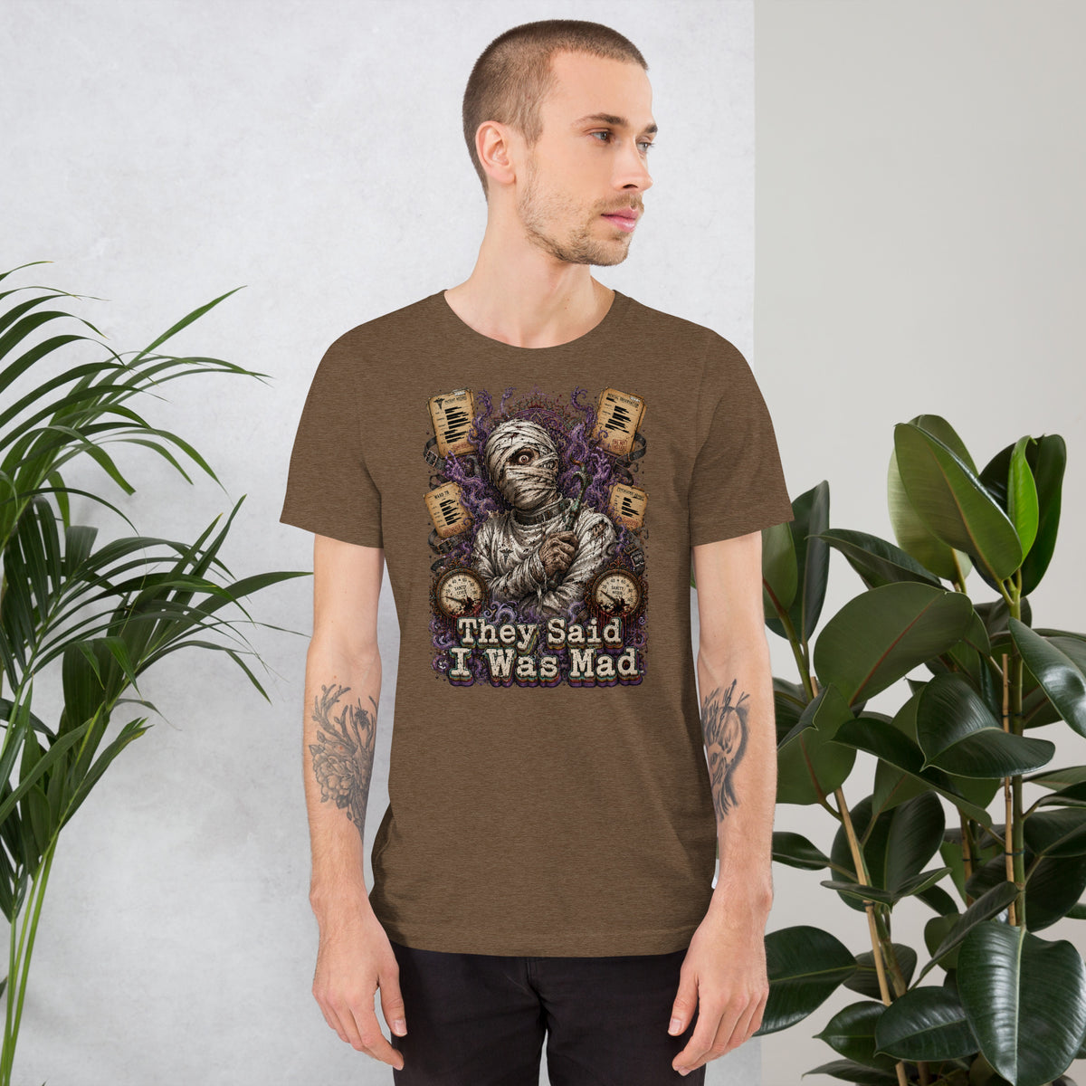 Horror and Mystery Lovers Unisex Staple T-Shirt — "They Said I Was Mad" Asylum Patient and Sanity Meter Design by printfluence.net